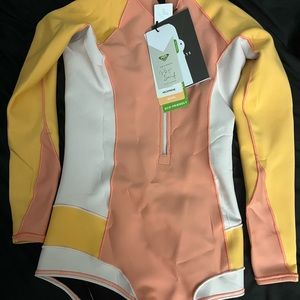 Brand new, never worn Pop Surf Roxy Wetsuit. Size 6.
